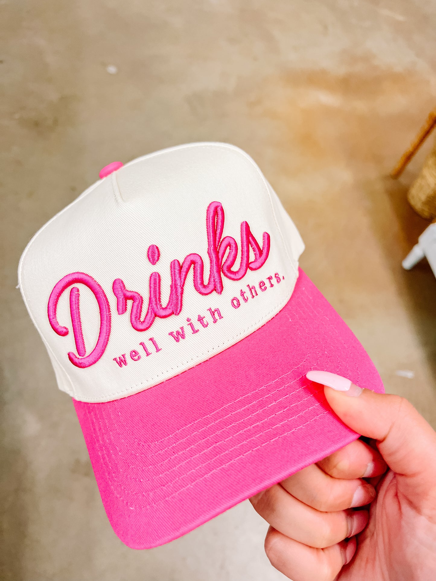 Drinks Well With Others Trucker-Pink